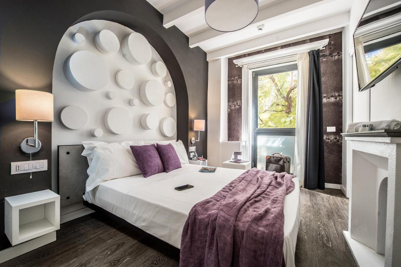 Emphasis Suites & Rooms Каляри Екстериор снимка